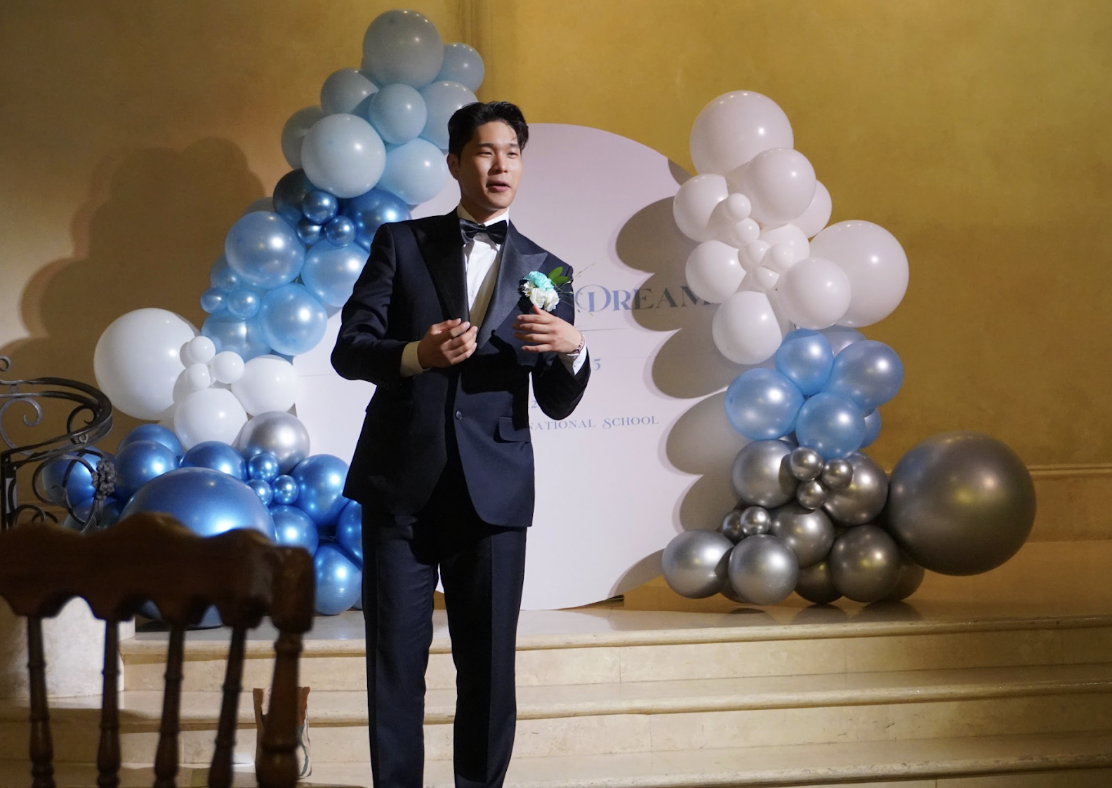 Joseph Kim (12) performing a song